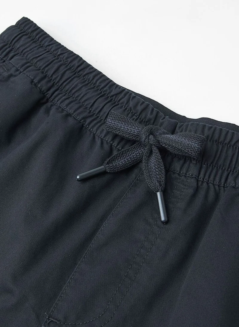 Giordano  Men's Slim Peach Twill Elastic Shorts for Men | Best Price UAE