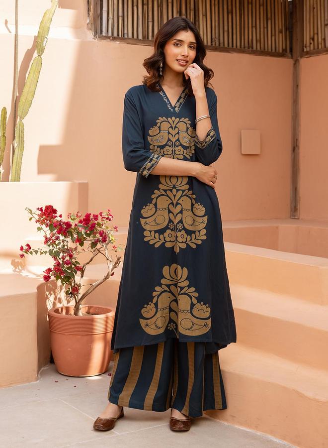 ISHIN Women's Blue Rayon Printed Tunic Upper Calf Length Palazzo Bottom Straight Fit 2 Peice Kurta Set - Image 1