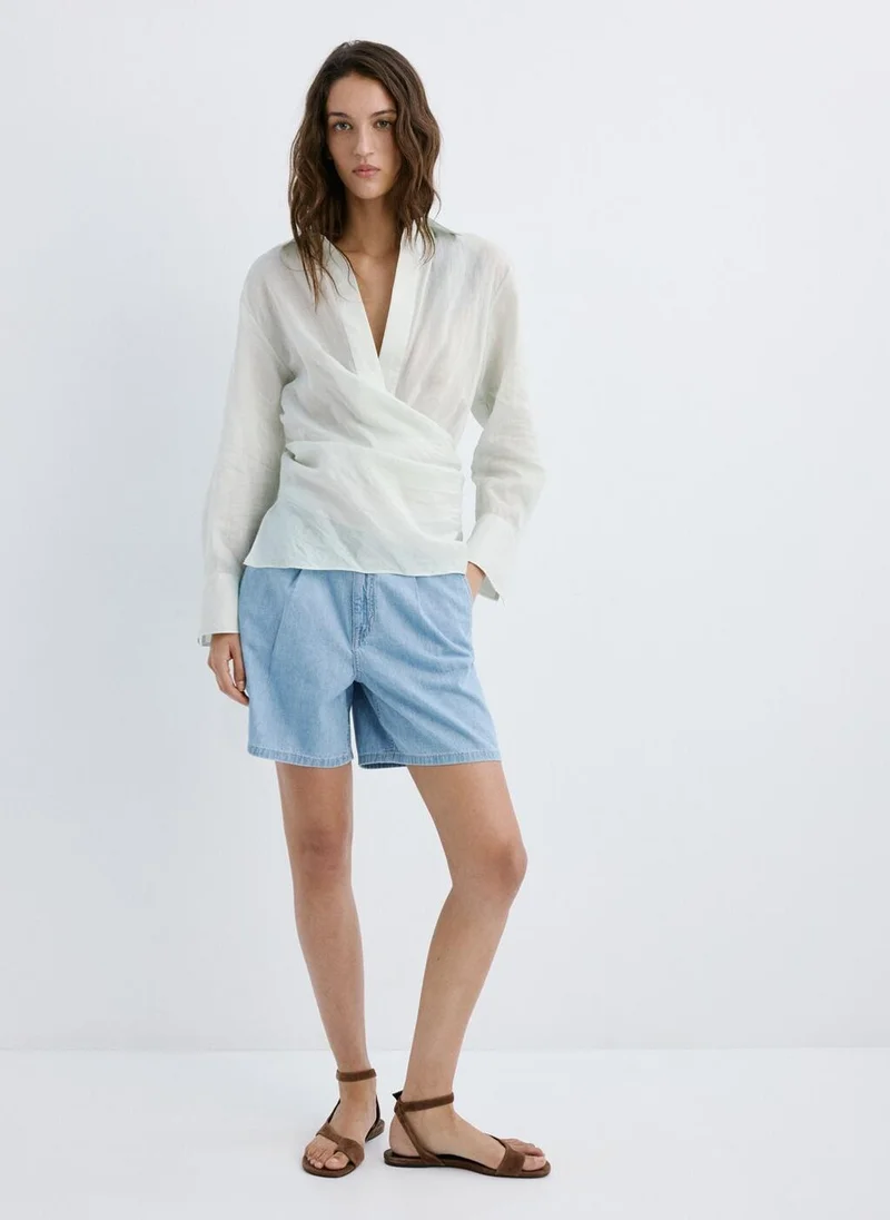 MANGO  Mid-rise denim bermuda shorts with pleats for Women | Best Price UAE