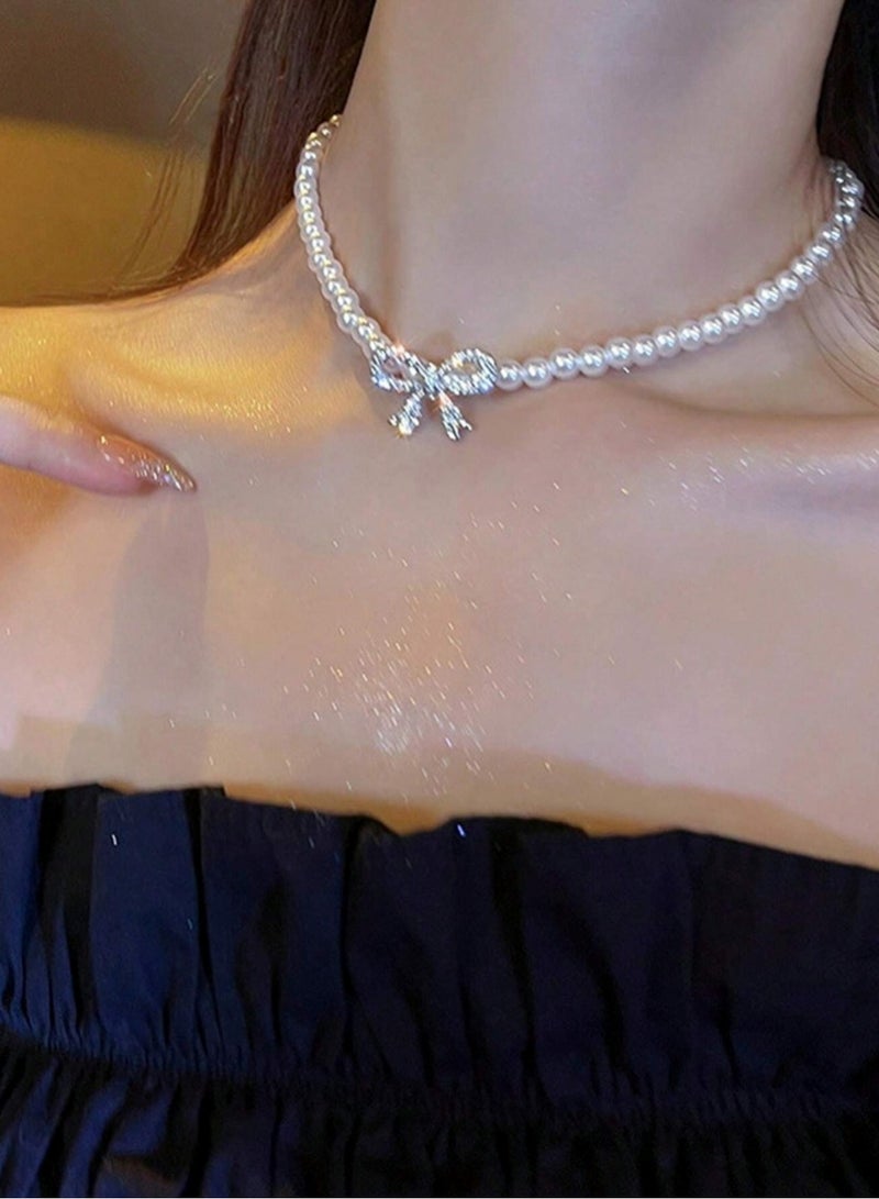 Pearl Necklace with Crystal Bow Pendant