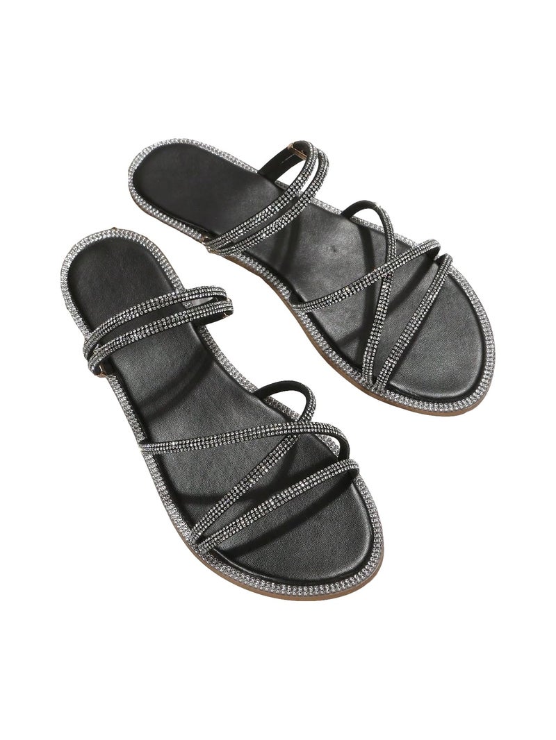 OYOANGLE Women's Rhinestone Strappy Open Toe Slide Sandals Slip on Casual Flat Sandals Black 8.5 - Image 1