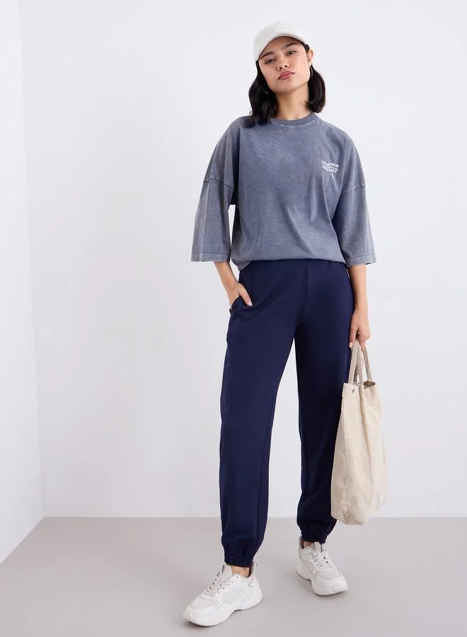 Styli Styli Charcoal Oversized Graphic Acid Wash T-Shirt