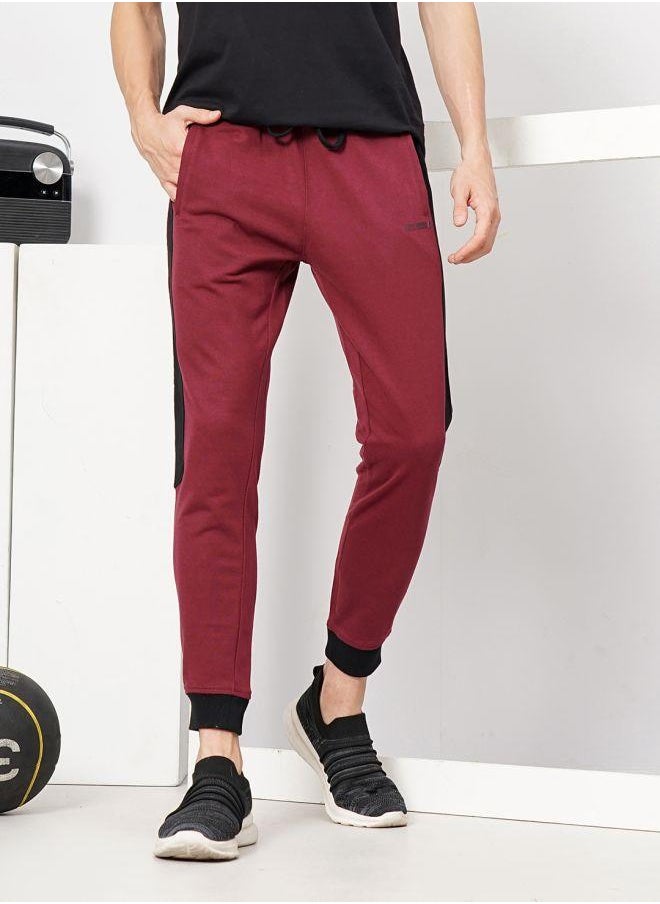 The Indian Garage Co Men Slim Fit Solid Mid-Rise Stretchable Knitted Jogger Trousers  - Image 1