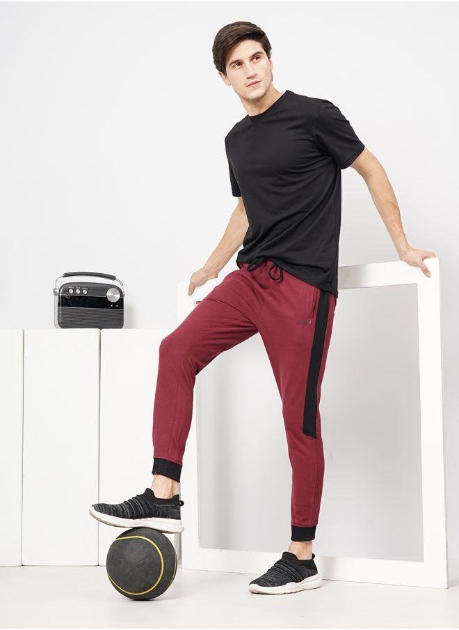 The Indian Garage Co - Men Slim Fit Solid Mid-Rise Stretchable Knitted Jogger Trousers - Image 1