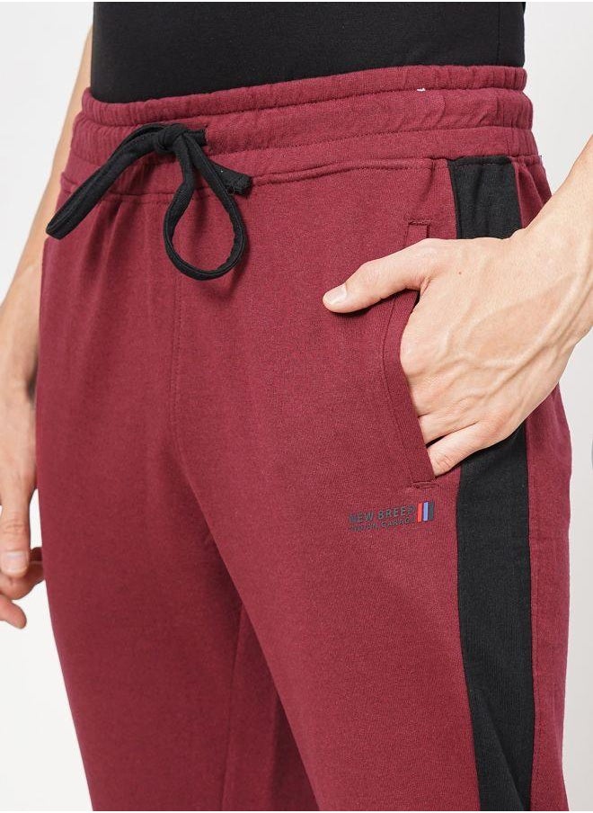 The Indian Garage Co - Men Slim Fit Solid Mid-Rise Stretchable Knitted Jogger Trousers - Image 1