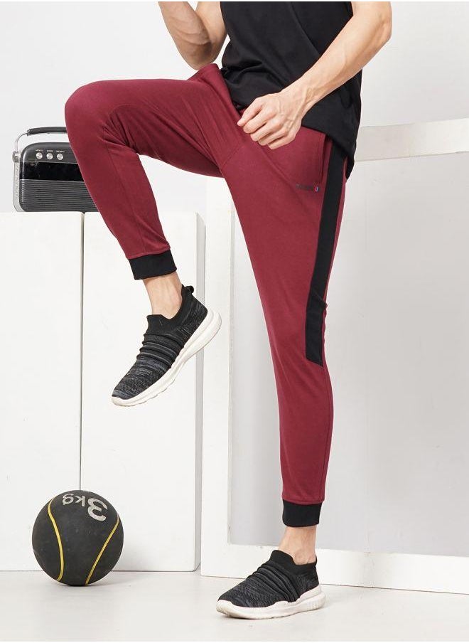 The Indian Garage Co - Men Slim Fit Solid Mid-Rise Stretchable Knitted Jogger Trousers - Image 1
