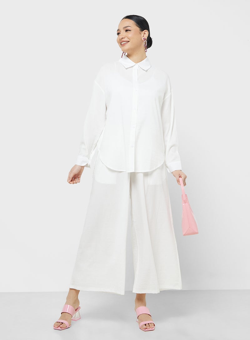 خزانة طقم قميص بأزرار وبنطلون واسع - Image 5