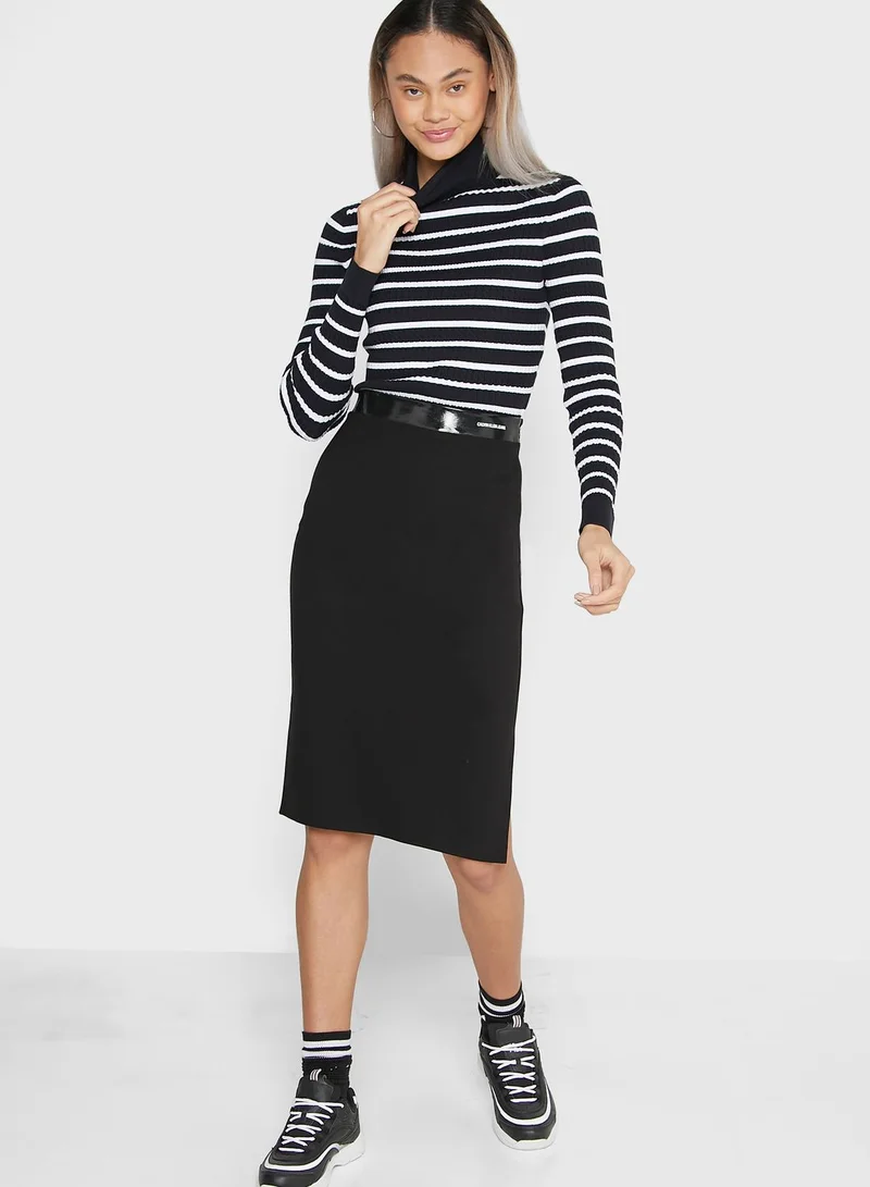 كالفن كلاين جينز تنورة ميدي بخصر مطاطي