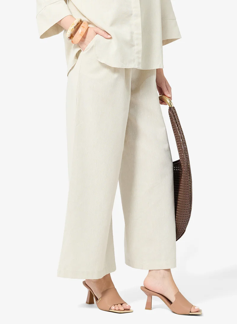 DKNY MMW - Marshmellow, BLK -  Black, FQ3 - Hot Cocoa, LT3 - Light taupe Kailyn Logo PVC Heeled Sandals for Women | Best Price UAE