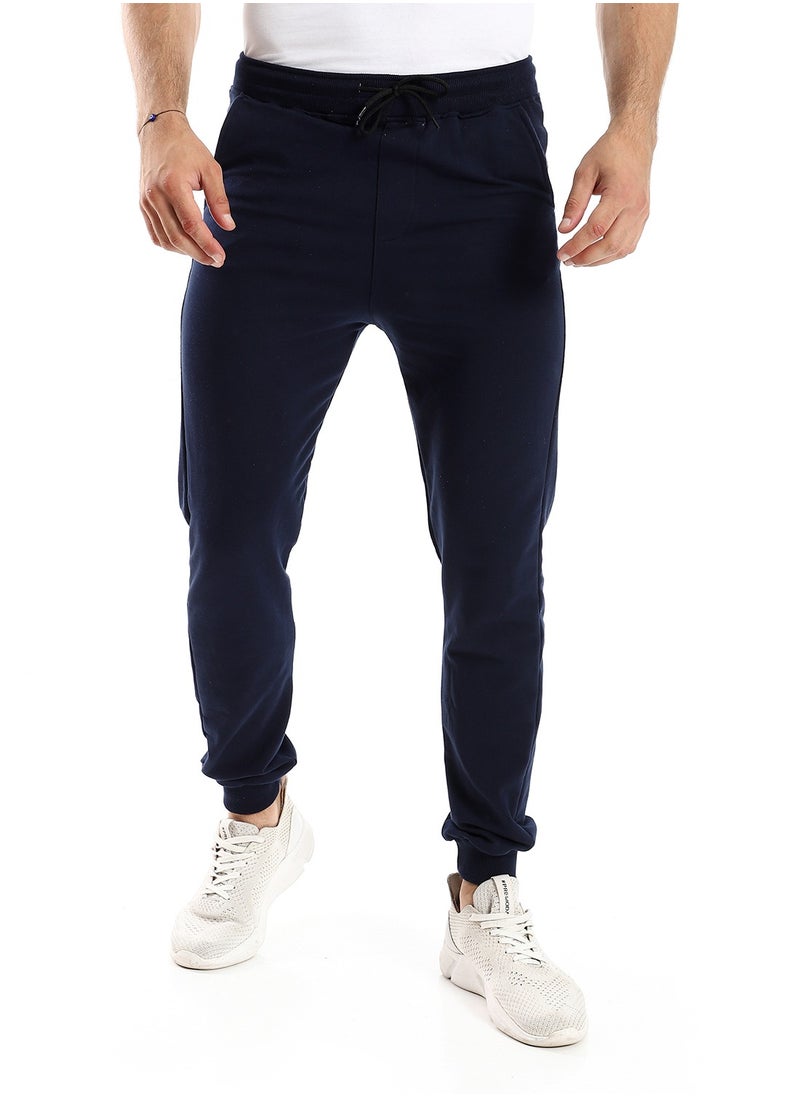 Solid Cotton Sweatpants With Hem - Navy Blue - pzsku/Z682407B703A3E70C3BF1Z/45/_/1707567258/10172d6f-47e8-4fa6-b738-41b5f5dbb2fe