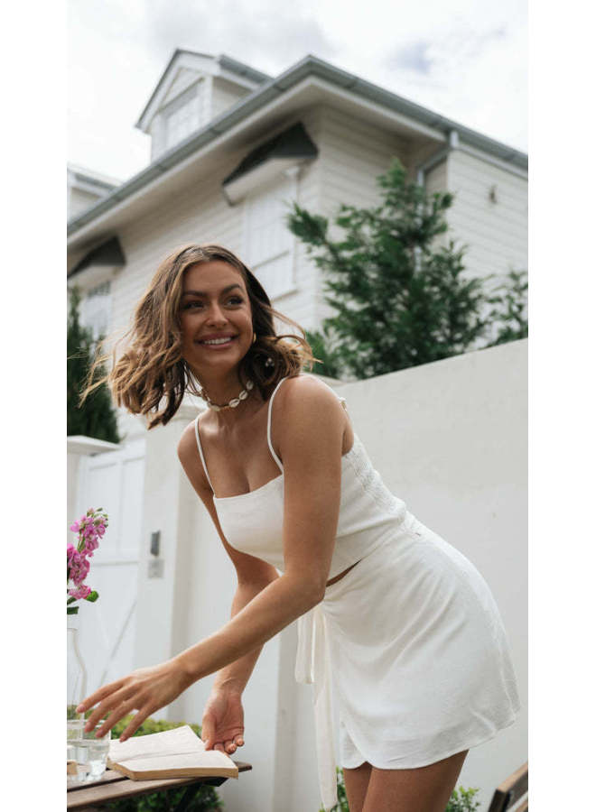 Song Feng Ya ملابس نسائية طقم جديد بلون موحد بلوزة بدون حمالات + تنورة ذات حافة غير منتظمة - Image 4