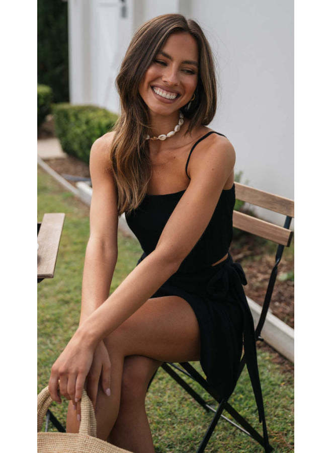 Song Feng Ya ملابس نسائية طقم جديد بلون موحد بلوزة بدون حمالات + تنورة ذات حافة غير منتظمة - Image 2