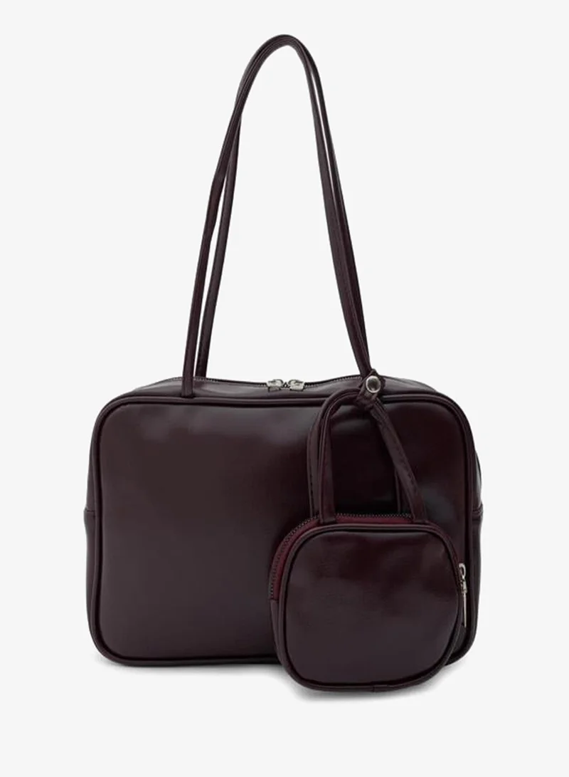 Maroon Shoulder Bag with Choker Charm.