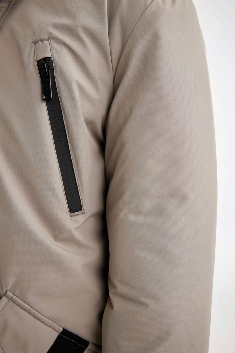 ديفاكتو جاكيت وتر بروف اولادي بكابيشون وسوسته - Image 5