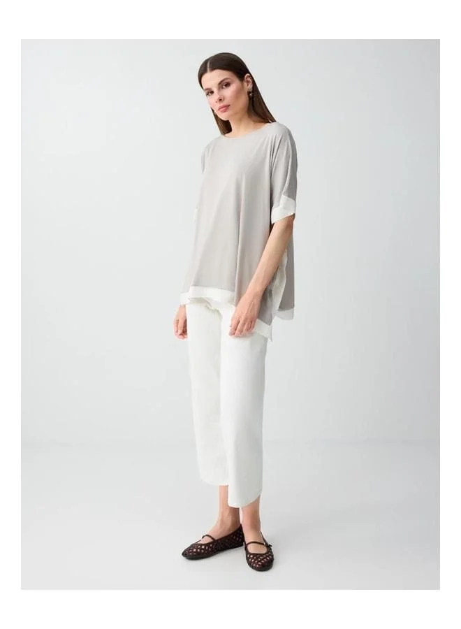 Jimmy Key Vizon Round Neck Low Shoulder Loose Fit Blouse.