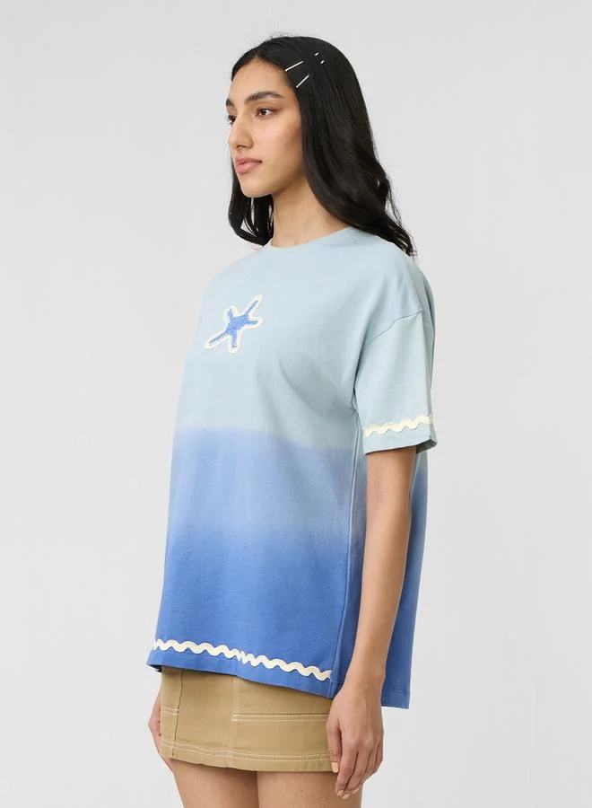 ذا سوليد ستور تيشيرت بمظهر أومبري وقصة واسعة