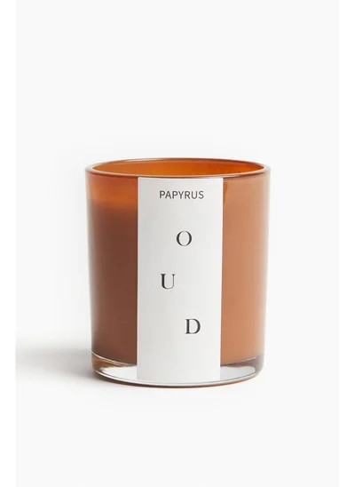 اتش اند ام Scented candle in a glass holder