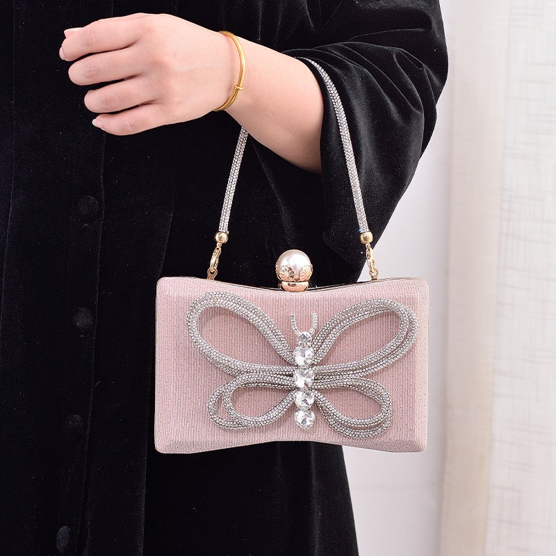 Elegant Black Bow Evening Clutch with Lock Clasp and Crossbody Strap - Image 3