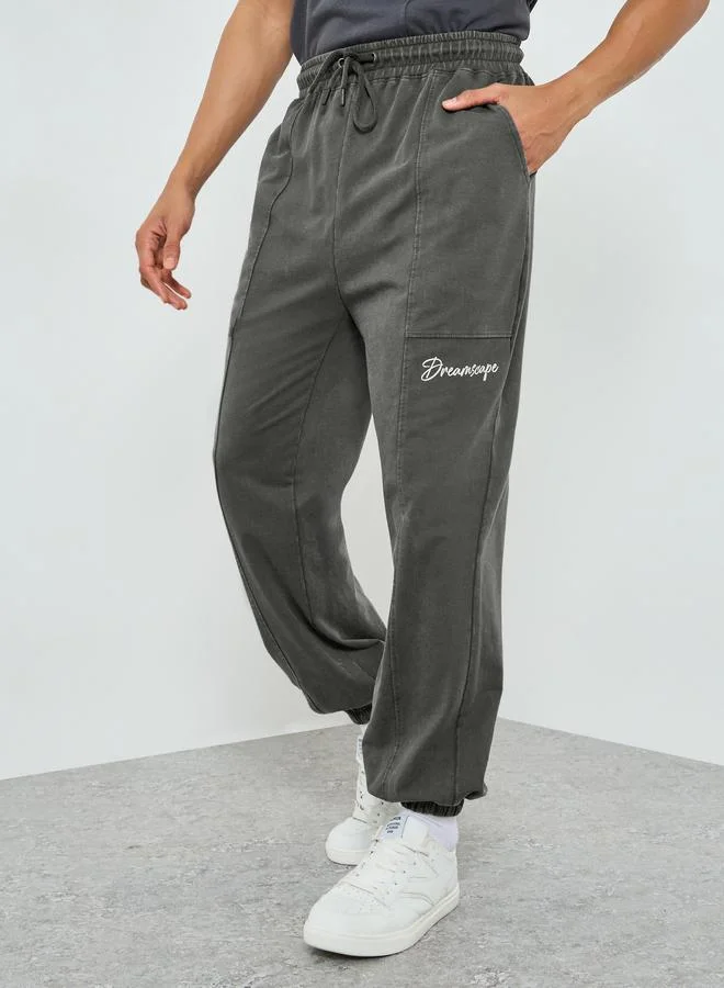 Men Grey Panelled Oversized Washed Joggers