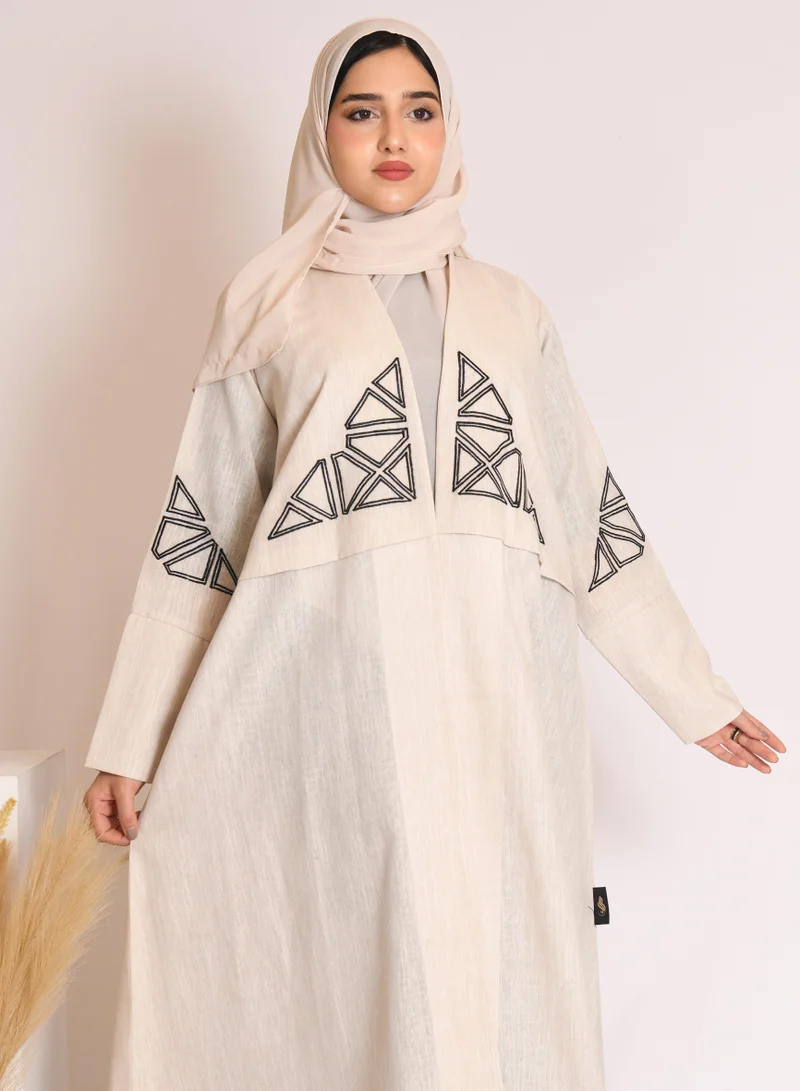 HAWRAA ABAYA Beige wrap abaya with black embroidery