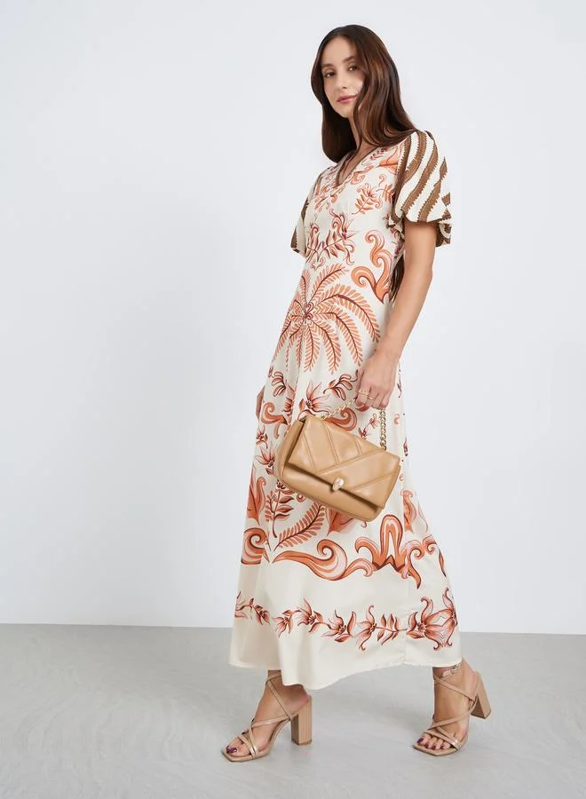 تايك تو فستان طويل بياقة v وطبعة كاملة