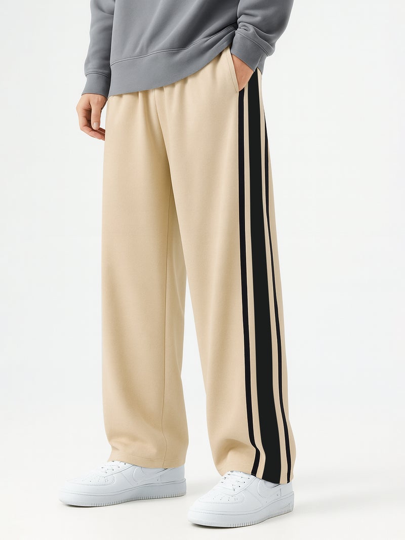 مانياك بنطلون رياضي رجالي فضفاض بلون بيج وأسود - Image 1