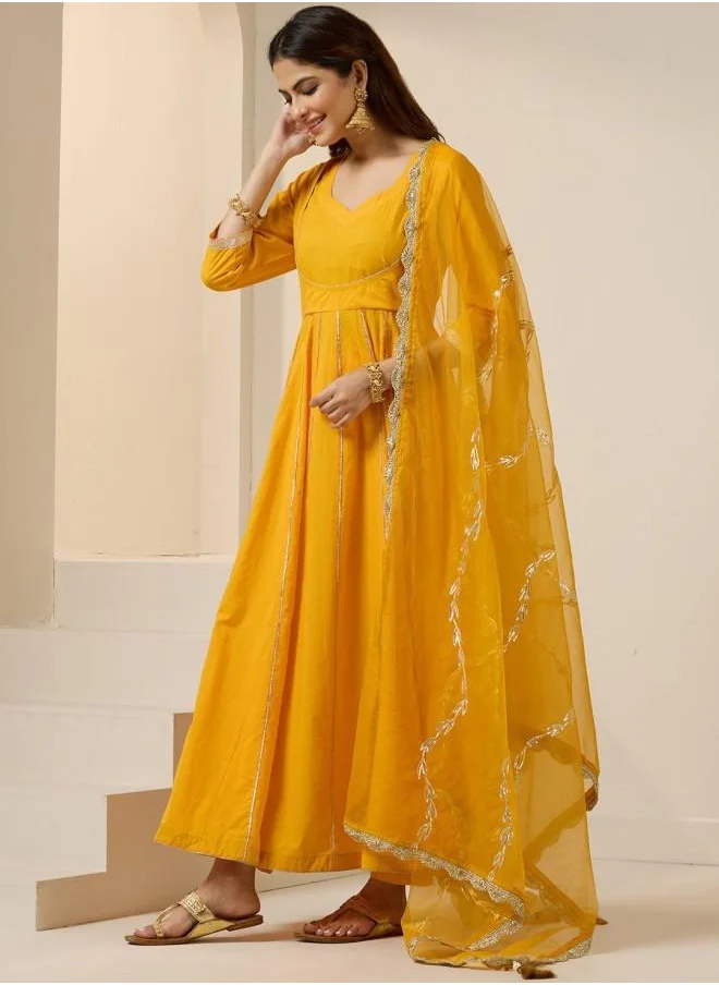 آي شين Elastic Women Yellow Cotton Kurta Set with Embroidered pattern Tunic and Palazzo features a Round neckline and Three-Fourth Sleeve secured with Elastic closure and styled in Straight Fit ideal for Festive moments — a must-have for your statement wardrobe.