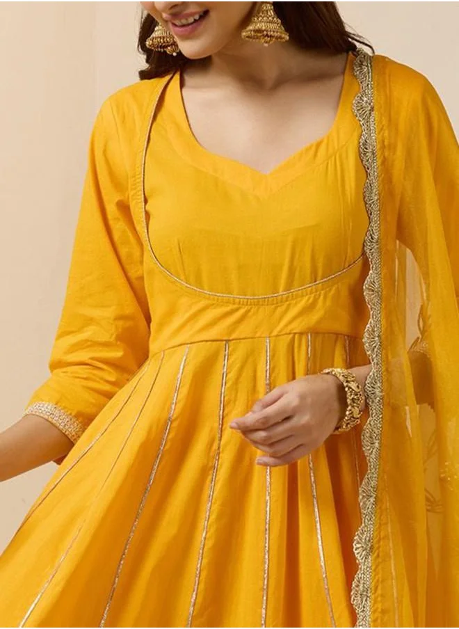آي شين Elastic Women Yellow Cotton Kurta Set with Embroidered pattern Tunic and Palazzo features a Round neckline and Three-Fourth Sleeve secured with Elastic closure and styled in Straight Fit ideal for Festive moments — a must-have for your statement wardrobe.