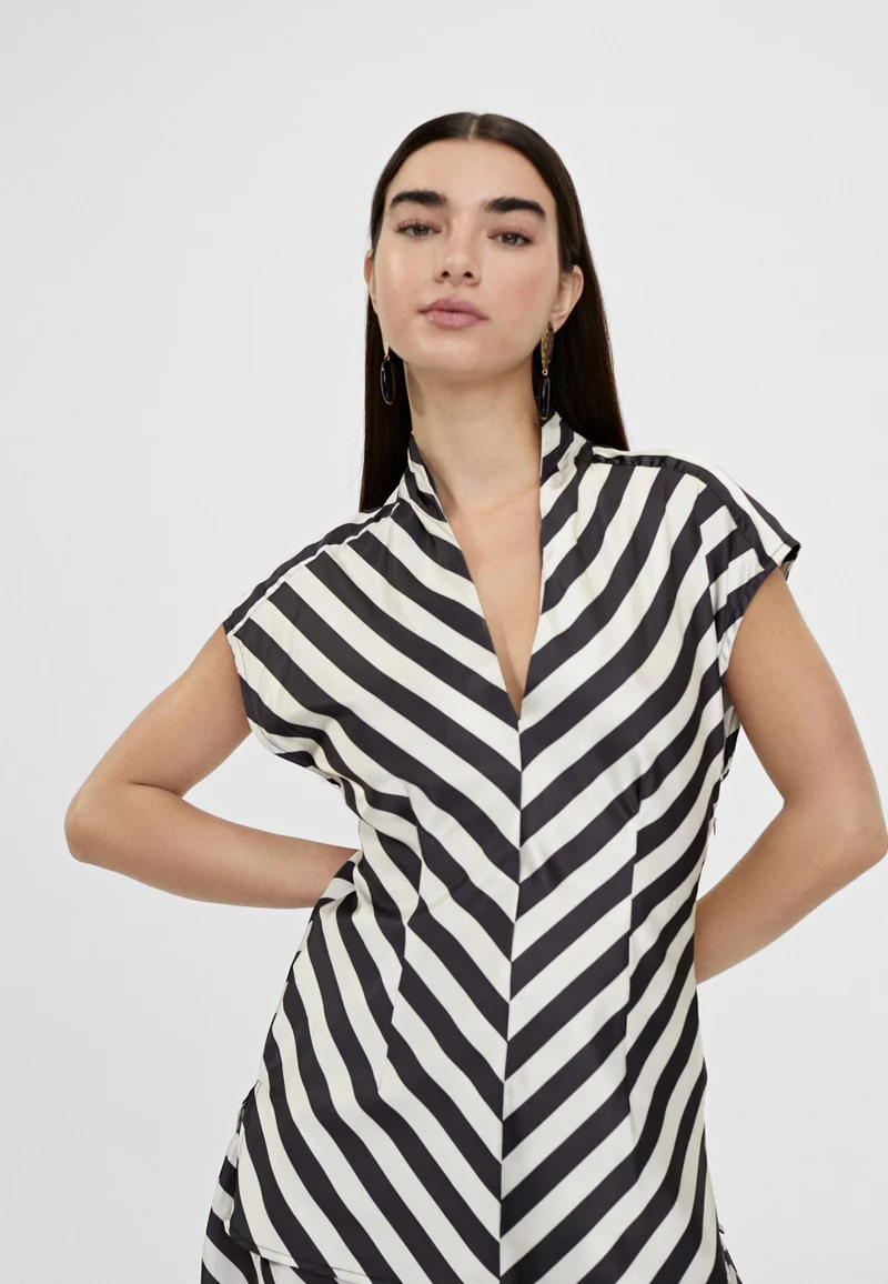 Lola Casademunt Two-tone striped top