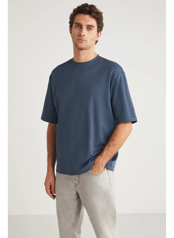 Grimelange Joel Men's %100 Organic Cotton Thick Fabric Special Textured Label Detailed Oversized Indigo T‑shirt.