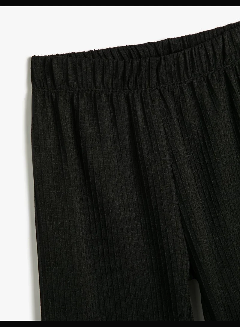 Koton  Trousers High-Rise Relax Fit Textured Standard Leg for Women | Best Price UAE