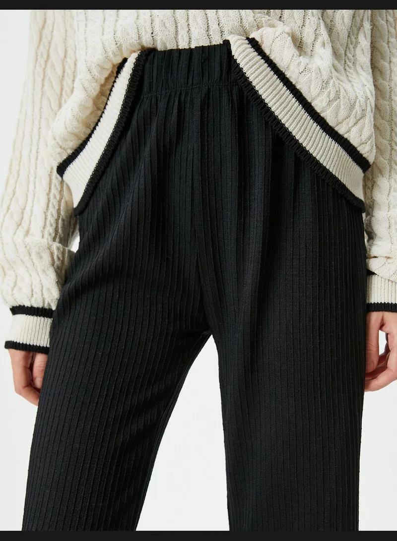Koton  Trousers High-Rise Relax Fit Textured Standard Leg for Women | Best Price UAE