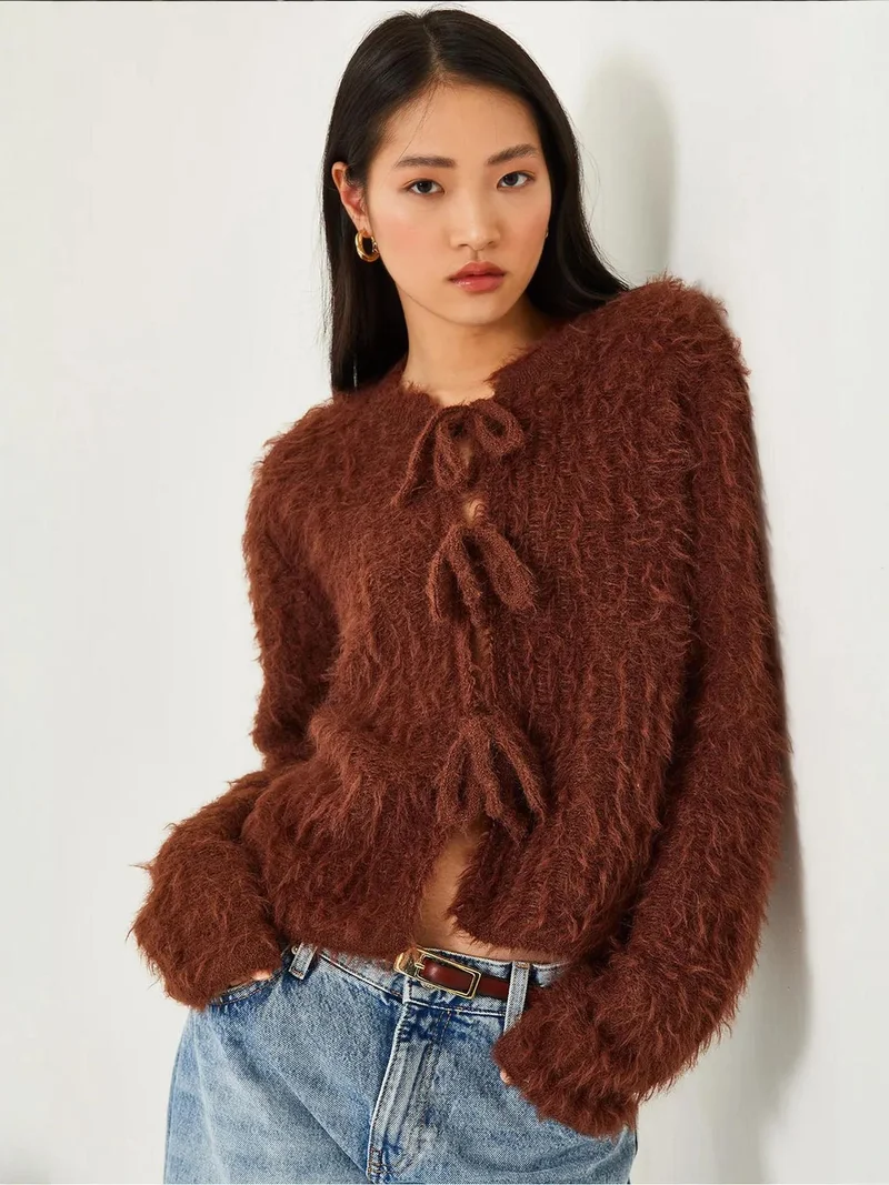 Bianco Lucci LUCCI Frilly Cropped Ribbed Knit Cardigan with Tie Closure