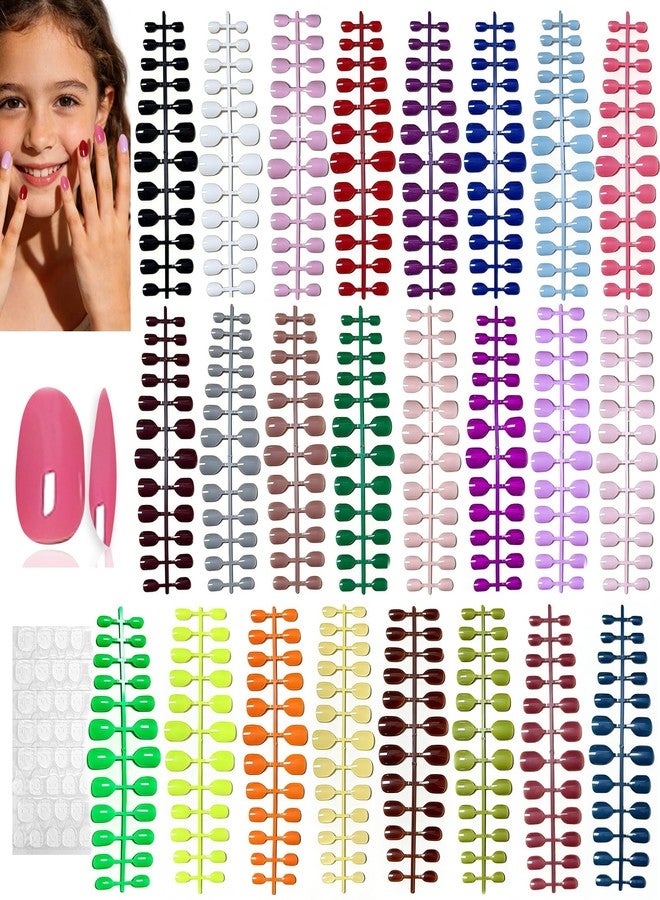 Wsimily 576 Piece Kids Short Press on Nails, Wsimily 24 Colors Little Girls Almond False Nails Acrylic Full Cover Fake Nails with Nail Adhesive Tabs, Children Women Girls Artificial Fingernails Decor - Image 1