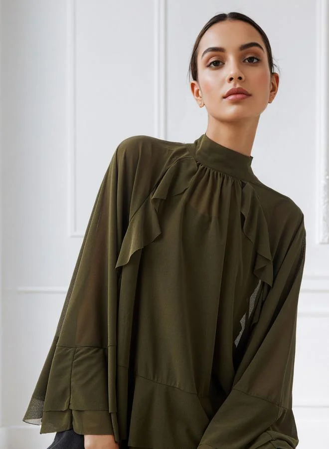 ايكونيك بلوزة كاب بأكتاف مكشكشة أيقونية