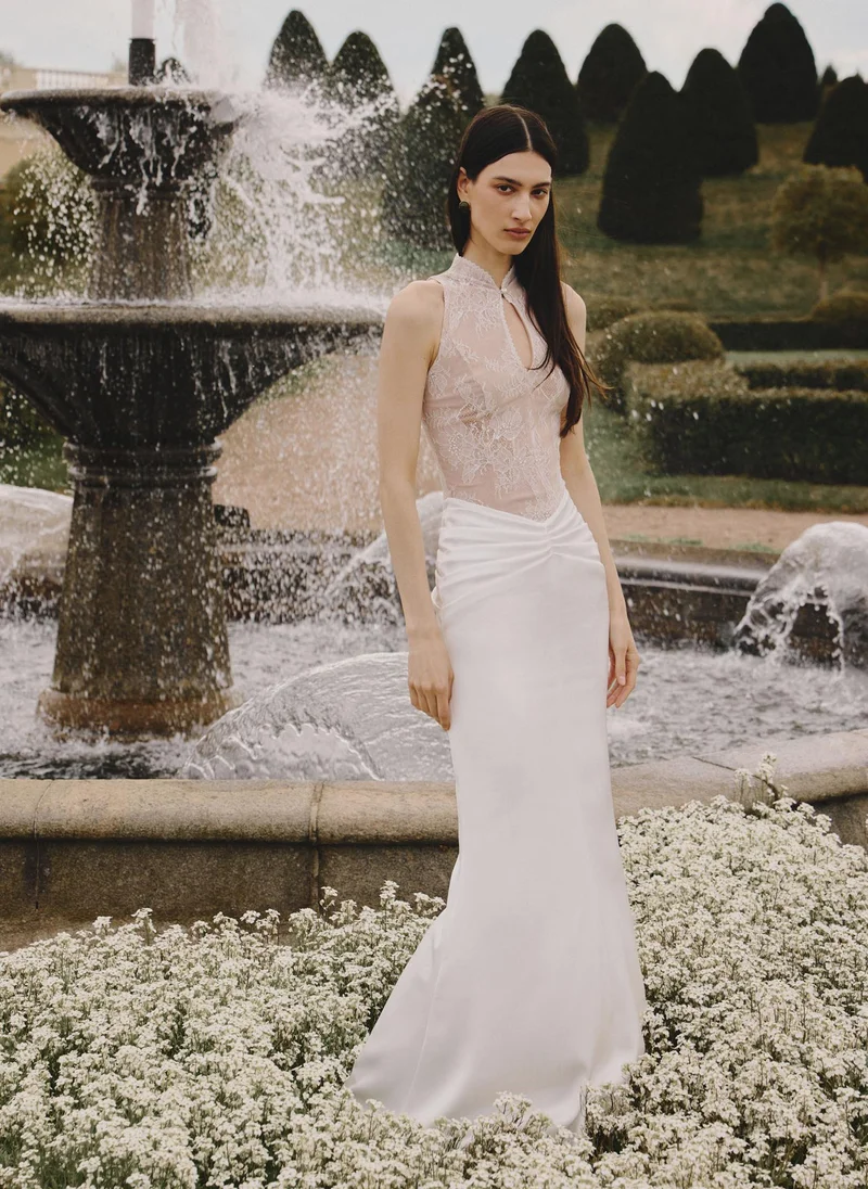 Maxi dress with a lace bodice and hip draping
