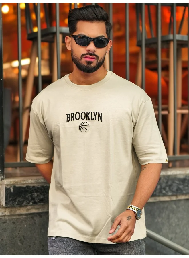 مانياك تيشيرت قطن رجالي مطبوع برقبة مستديرة وأكمام نصفية بلون البسكويت