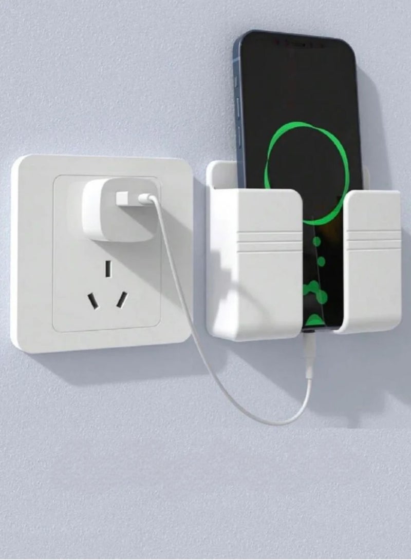 حامل جداري للجوال و الريموت، حامل جوال مع لاصق يثبت على الجدار ، حامل جوال يثبت على الحائط ، عدد حبة واحدة ستاند جداري ، حامل موبايل لتعليق الجوال، ستاند جداري للمساعدة على شحن الجوال بجانب القابس، حامل جوال يتعلق بالجدار، حامل اجهزة التحكم عن بعد، حامل للهاتف مع فتحة سفلية لشحن الجوال اثناء التعليقو متوافق مع العديد من الأجهزة، قطعة تعليق و حمل جهاز الجوال و ريموت التلفاز مع لاصق - عدد 1 حبة ابيض اللون. - Image 1