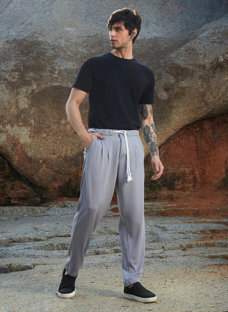 Campus Sutra Campus Sutra Men's Chalk White Korean Tailored Trousers For Casual Wear | Regular Fit | Low-Rise | Button Closure | Trousers Crafted With Comfort Fit For Everyday Wear - Image 5