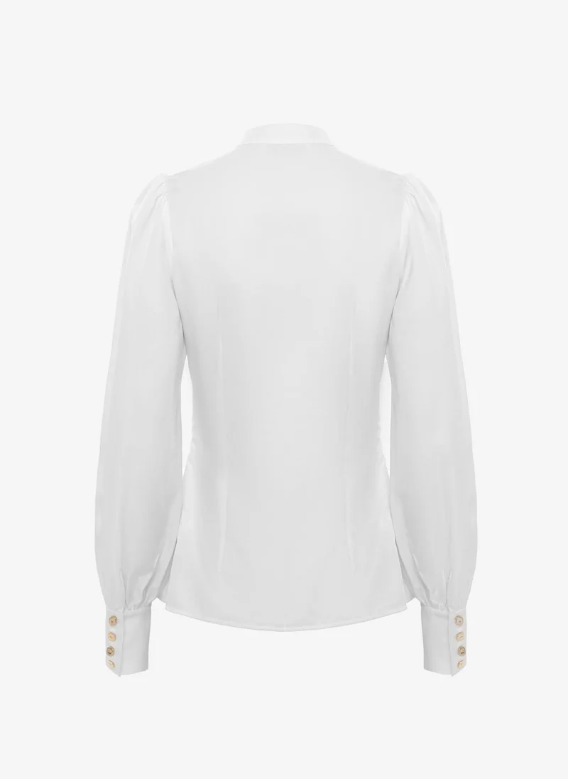 Lichi Shirt with voluminous sleeves and golden buttons