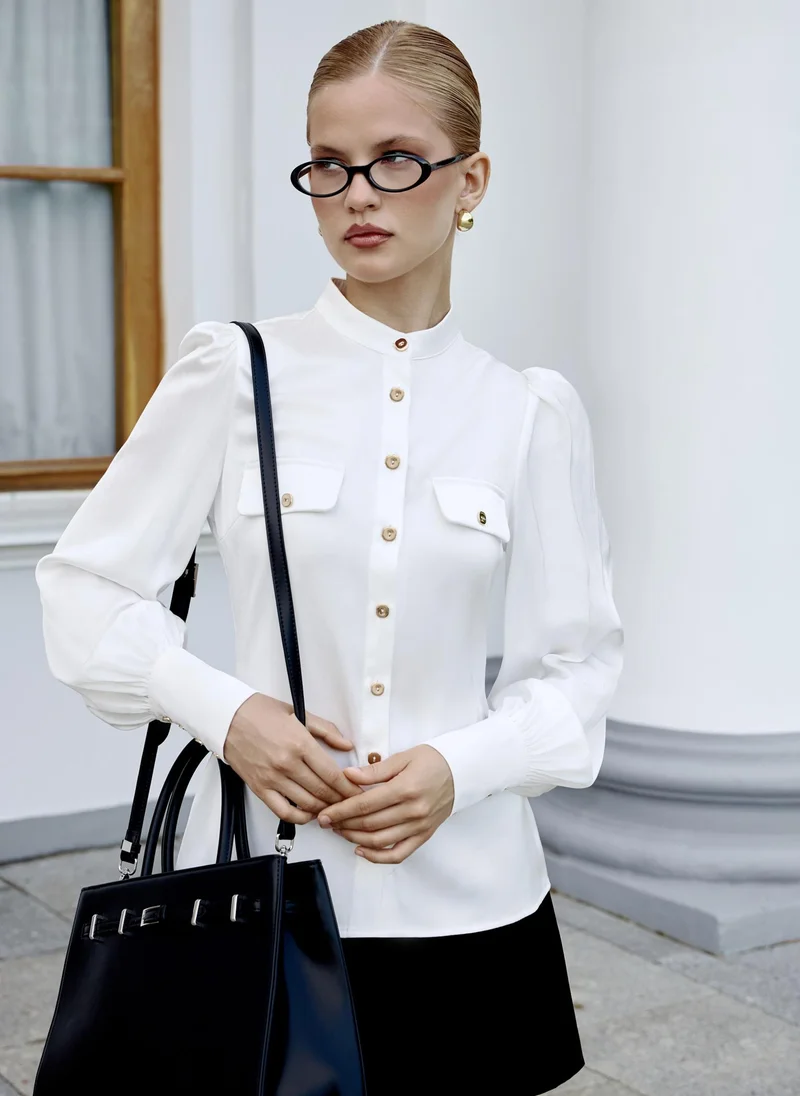 Lichi Shirt with voluminous sleeves and golden buttons