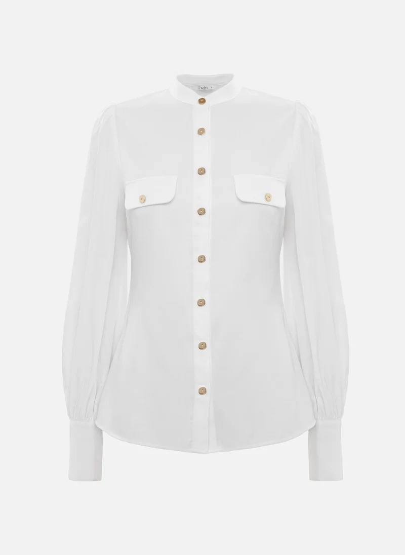 ليتشي قميص بأكمام واسعة وأزرار معدنية