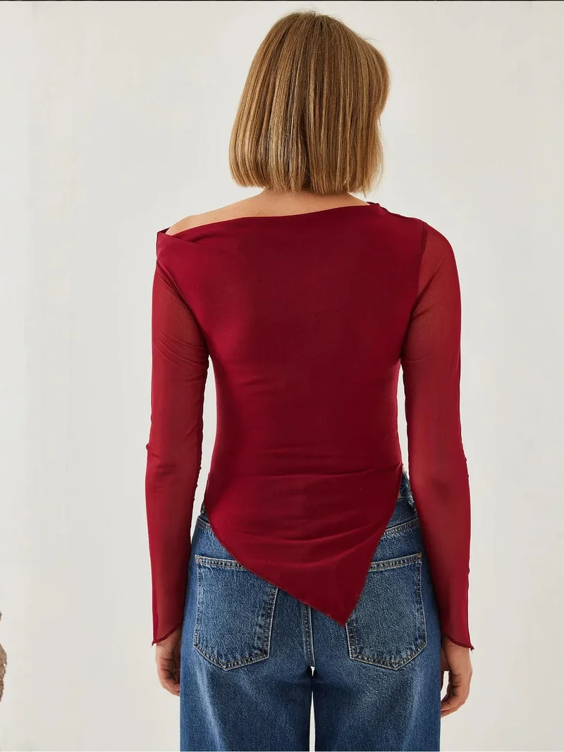 بيانكو لوتشي لوتشي بلوزة أساسية بحافة غير متماثلة