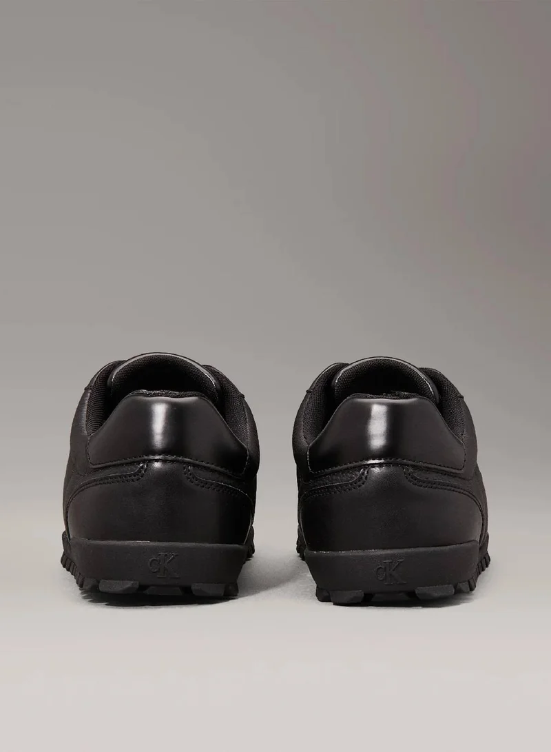Calvin Klein Jeans Triple Black Leather Low Profile Trainers for Men | Best Price UAE