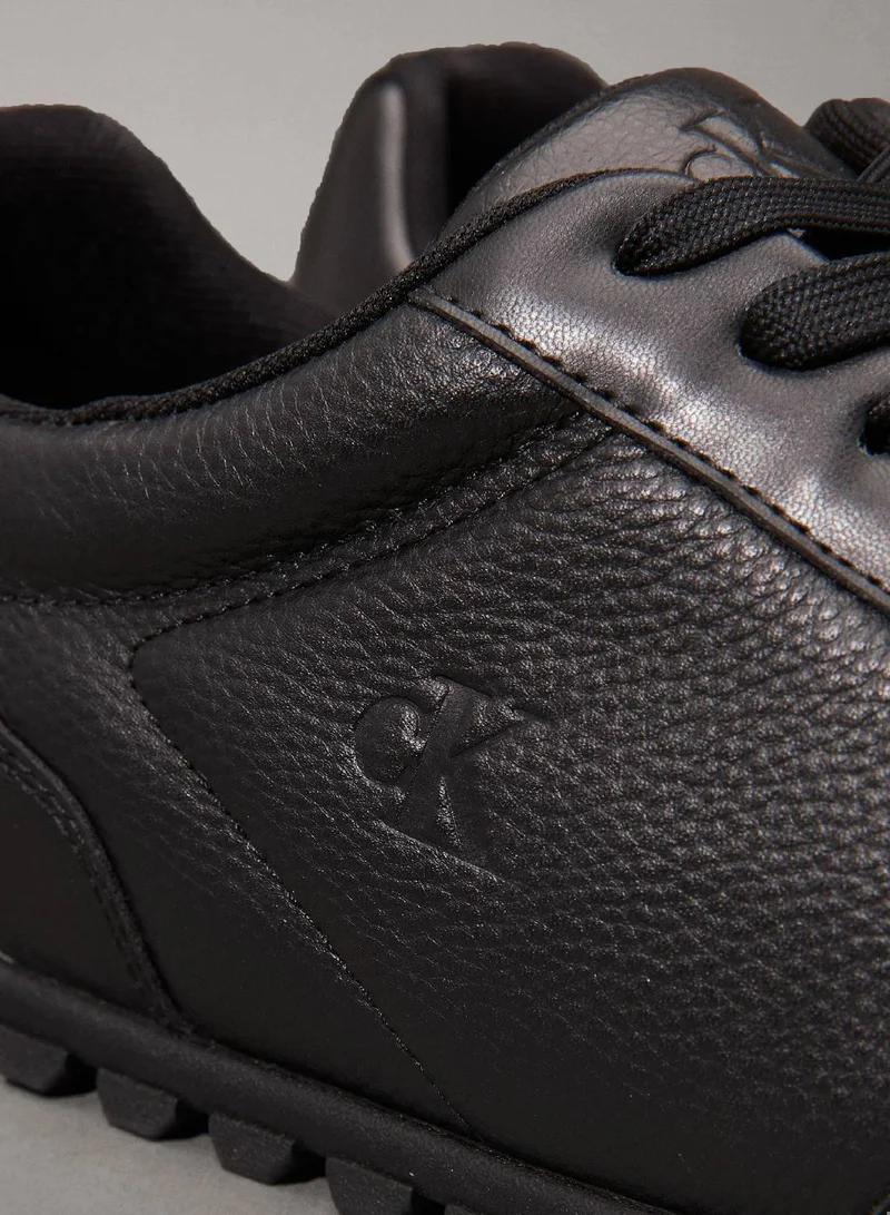 Calvin Klein Jeans Triple Black Leather Low Profile Trainers for Men | Best Price UAE