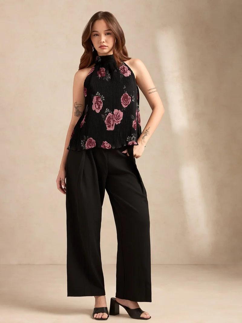 OUTZIDR  Black Halter Neck Plisse Flared Printed Top for Women | Best Price UAE