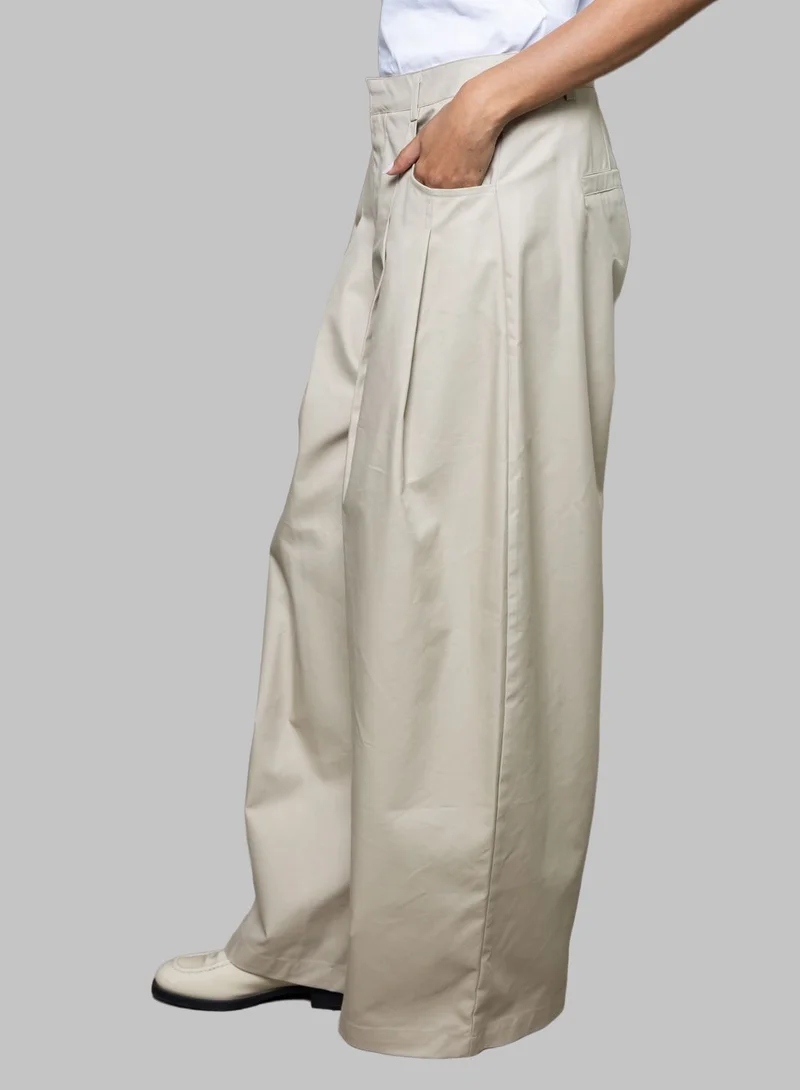 بوند بنطال واسع بقصة منظمة وخصر مرتفع باللون البيج