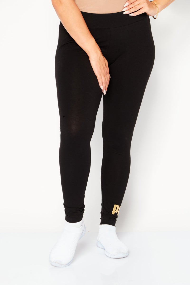 PUMA Women Sportswear Fit Training Tights, Black/Gold - Image 1