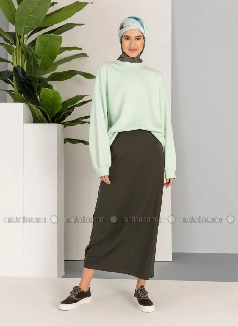بي ويست تنورة رياضية بجيوب كاكي