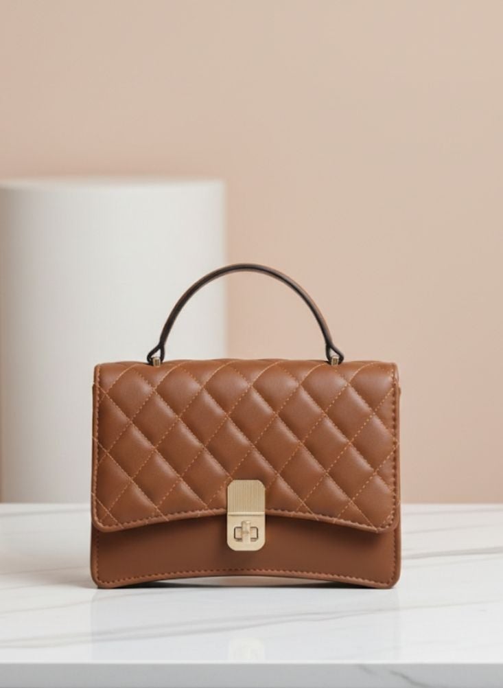 بريميم حقيبة يد نسائية بنية اللون، مبطنة، بمقبض علوي، بتصميم خياطة كلاسيكي وقفل ذهبي. - Image 1